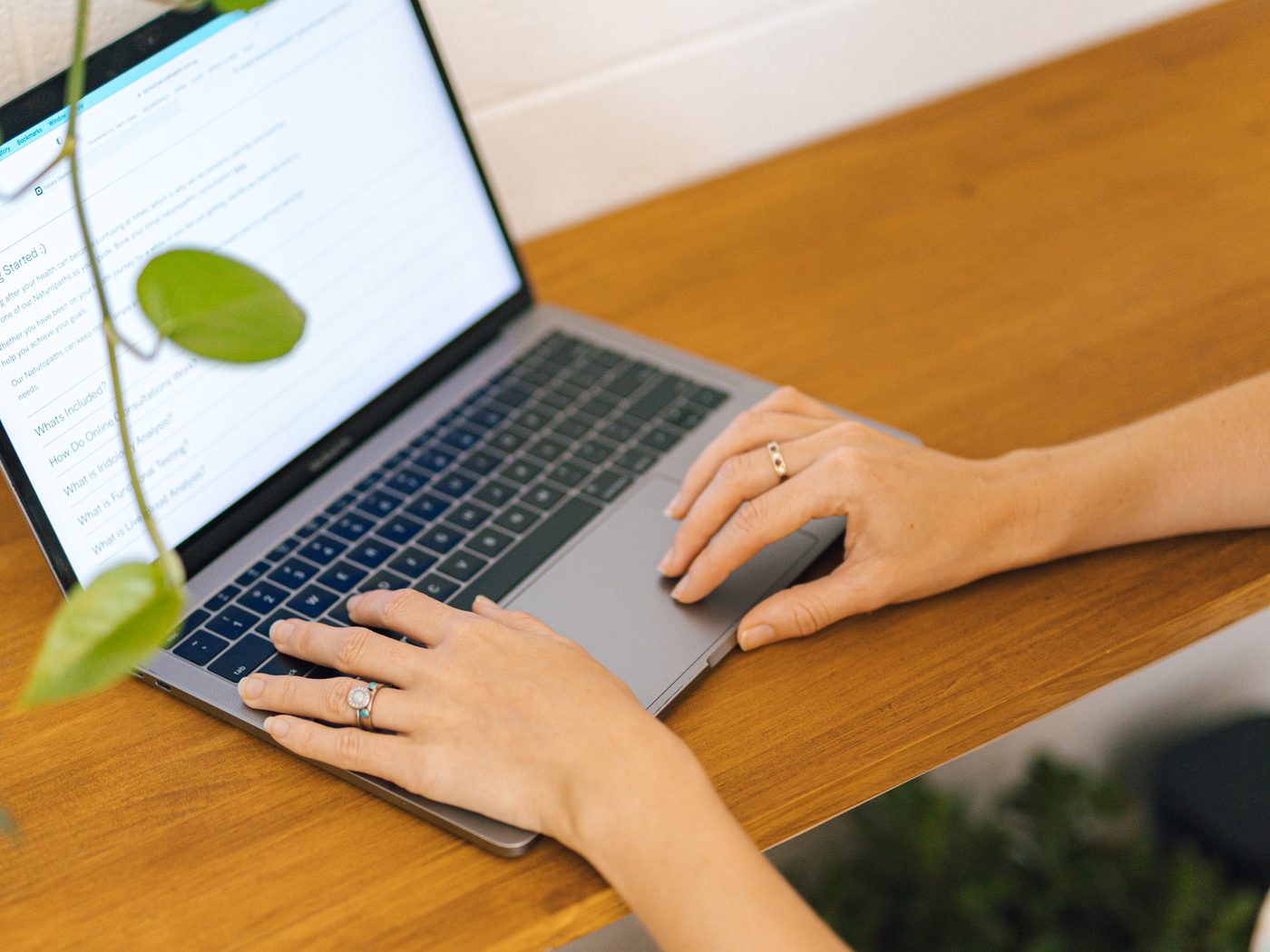 An online naturopathy consultation underway on a laptop